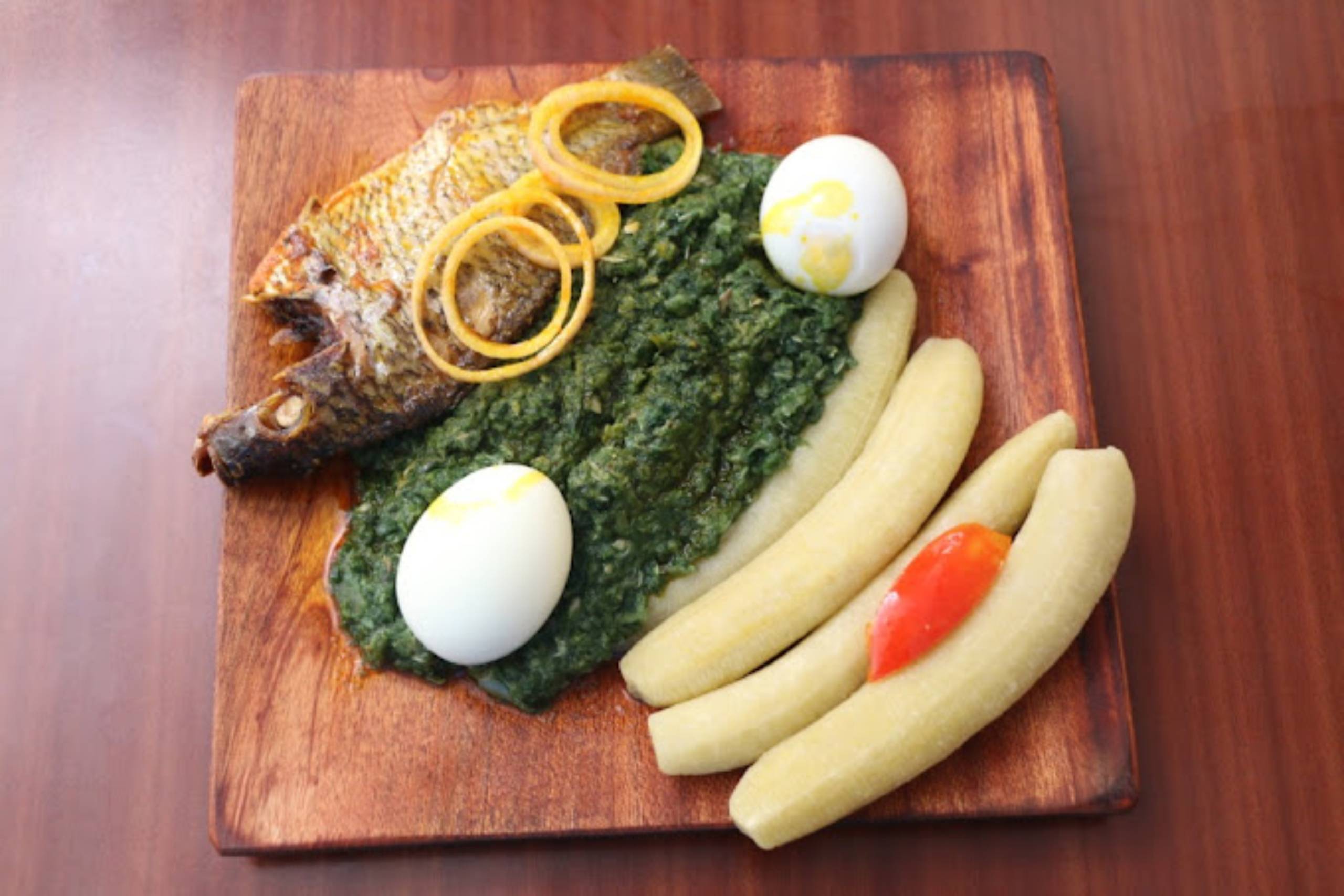 Pouring sauce on a burger